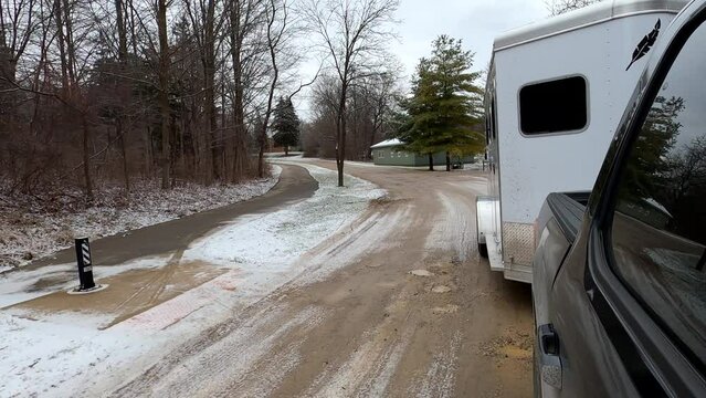 Hauling a horse trailer on a rough dirt road in Southeast Michigan - 4k