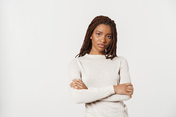Young black woman with pigtails posing and looking at camera