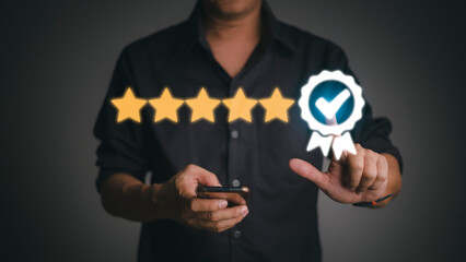 Hand touches the sign of the top service Quality assurance 5 star, Guarantee, Standards, ISO...