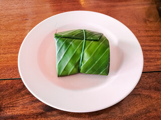 Thai food. Sticky rice wrapped in banana leaves