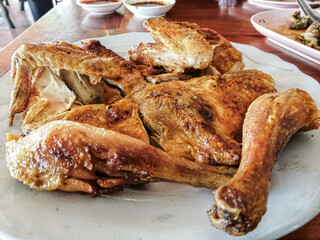 Grilled chicken Thai style served in a restaurant.
