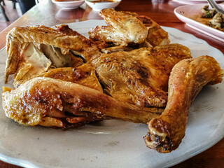 Grilled chicken Thai style served in a restaurant.