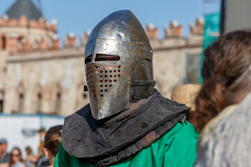 Naklejka premium Historical restoration of knightly fights. Summer time medieval festival .Festival of medieval culture in the old fortress with knightly battles.