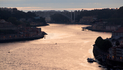 Rio Duero gold color in sunset - Oporto