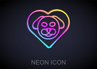 Glowing neon line Heart with dog icon isolated on black background. Pet paw in heart. Love to the animals. Vector