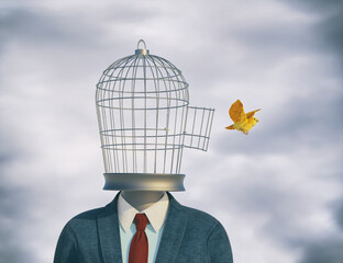 Businessman with a bird cage head and a canary flying off.