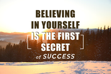 Believing In Yourself Is The First Secret Of Success. Inspirational quote saying that self confidence will bring you thriving results. Text against beautiful mountain forest during sunrise - obrazy, fototapety, plakaty
