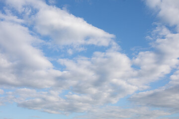 Naklejka na ściany i meble Cloudscape with the white clouds