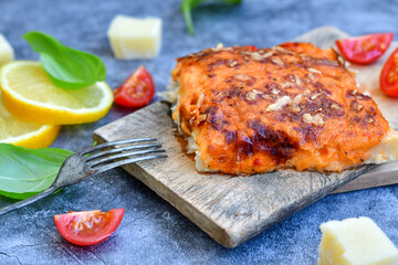  Fish bake preparated in Ticino style  with sweet gorgonzola  cheese and tomato crust