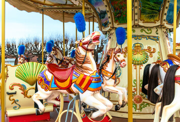 Fototapeta na wymiar Shiny children's carousel with toys