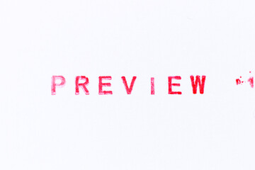 Red color ink rubber stamp in word preview on white paper background