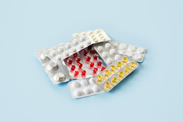 Covid pills concept. Many pills and capsules in blisters. COVID-19 coronavirus drugs, First antiviral anti-covid pills for treat covid-19 virus disease