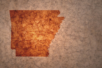 map of arkansas state on a old vintage crack paper background