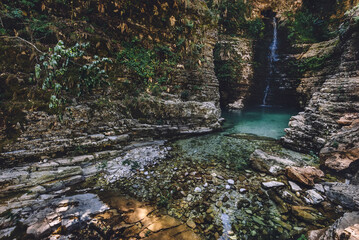 Obraz premium Peshtura Waterfall Cliffs and Karst Gorge in Albania