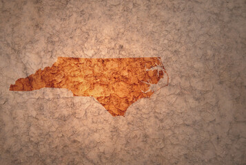 map of north carolina state on a old vintage crack paper background