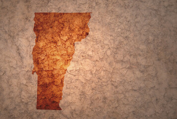 map of vermont state on a old vintage crack paper background