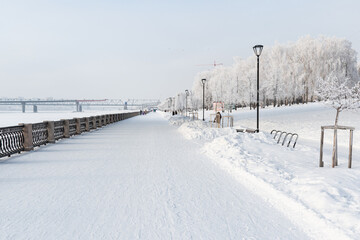 Beautiful city landscape in snowy winter. Novosibirsk embankment