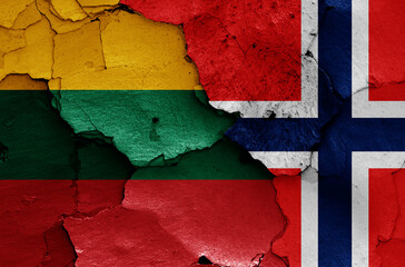 flags of Lithuania and Norway painted on cracked wall