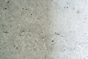 Background with a concrete wall with a fine texture in a house under construction.