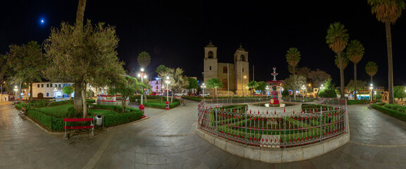 Night image of the central park of the town of Caraz, in Ancash, Peru
