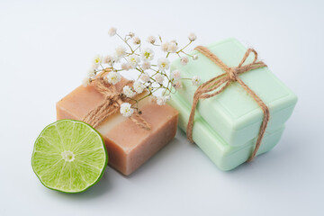 Fototapeta na wymiar Handmade soap with lime on a white background.