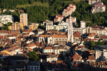 Obraz premium The city of Gap from above with a view on Notre-Dame-et-Saint-Arnoux cathedral. Hautes-Alpes (Alps), France