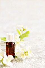 Oil of jasmine. Aromatherapy with jasmine oil. Jasmine flowers