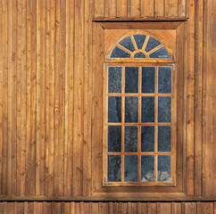 General view and close-up of architectural details of the 8th-century historic wooden Catholic church of Saint Barbara in the town of Kramarzewo in Podlasie, Poland.