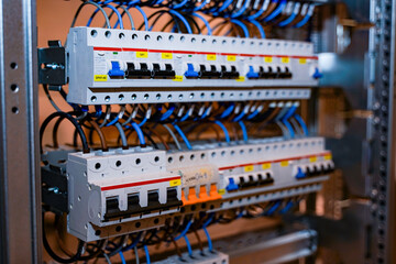 Detail of switches and differentials for the light of an industrial electrical panel.