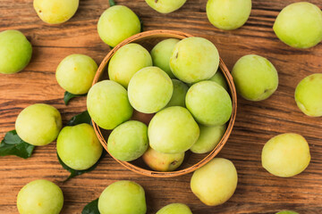 Fresh green plum and preserved green plum