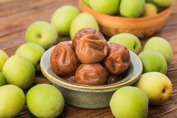 Fresh green plum and preserved green plum