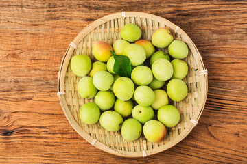 Fresh green plum and preserved green plum
