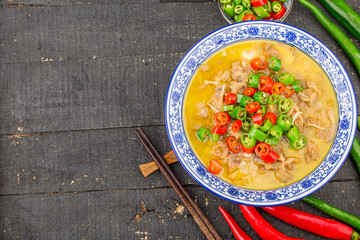 A delicious Chinese Cantonese dish with beef in golden soup