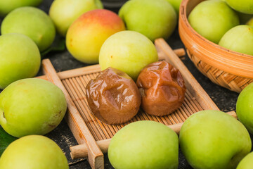 Fresh green plum and preserved green plum