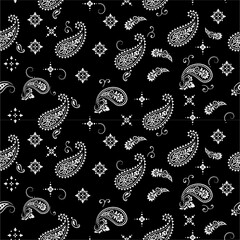 Seamless pattern based on the paisley Bandana Print ornament. Boho vintage style vector background. A silk scarf or a handkerchief with a square pattern, the best motif for printing on fabric or paper