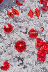 white Christmas tree with red toys