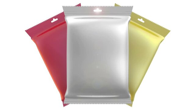Flexible consumer packaging. Three sealed packages from a polymeric film (flow-pack). Model of consumer packaging. Footage video