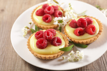 lemon and raspberry cake on plate