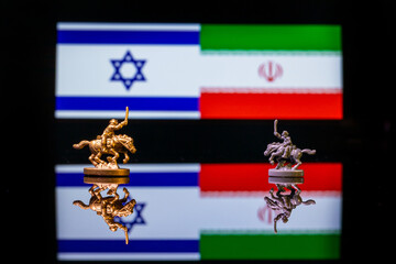 Conceptual image of war between Israel and Iran using toy soldiers and national flags
