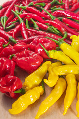 Close-up of lemon drop, habanero and thai peppers