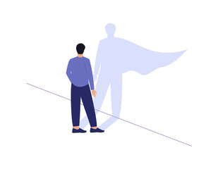 A businessman casts a shadow of a superhero in a cape on the wall.