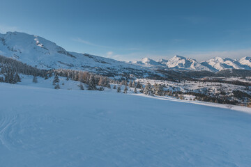 A picturesque landscape view of the French Alps mountains on a cold winter day (Hautes-Alpes, Devoluy valley)