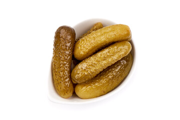Pickles, marinated cucumbers, isolated on white background. High resolution image.