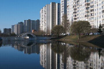 View of the city from the shore of the pond