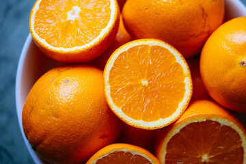 Fresh Oranges in a white bowl
