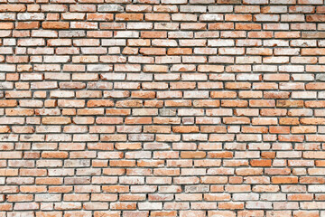 red brick wall of various shades