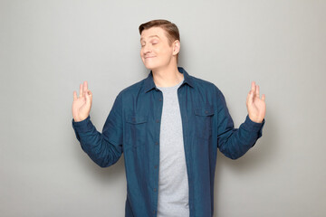 Portrait of happy mature man showing okay gestures and smiling