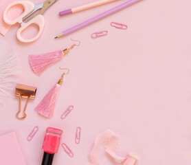 Pink school girly accessories and stationery on pastel pink background Top view