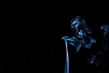 Fototapeta na wymiar Smoke on a black background