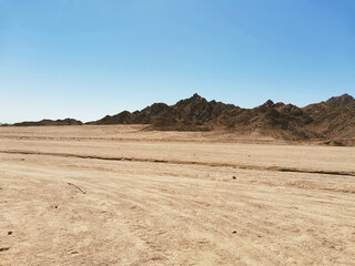 the road and rocks in the desert